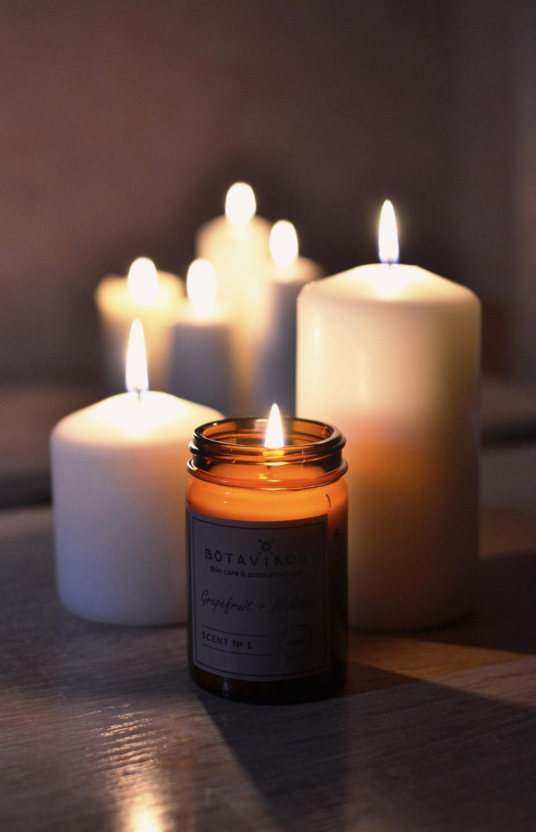Example tribute photo — gentle candlelight (placeholder) for Ava Catherine Shoening